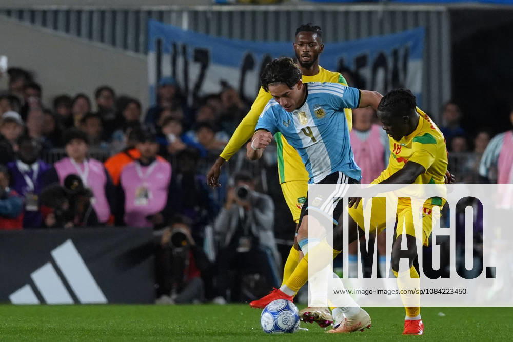 Messi bade farewell to Argentina in the friendly match against Benin BUENOS AIRES, ARGENTINA - OCTOBER 6: Agustín Giay (4) of Argentina in action during the friendly match between Argentina and Benin in Buenos Aires, Argentina on October 6, 2026. Argentine football legend and national team, Nationalteam captain Lionel Messi goodbye to the crowd during his farewell match in front of over 80,000 spectators at the Monumental Stadium. Argentine football star Lionel Messi played his final international match, Länderspiel, Nationalmannschaft in the friendly game between Argentina and Benin. The 39-year-old walk onto the stadium pitch for the final time in the sky-blue and white jersey, entering his farewell as Argentina s record appearance-maker and leading scorer with 207 caps and 125 goals. Luciano Gonzalez Anadolu Buenos Aires Argentina. Editorial use only. Please get in touch for any other usage.