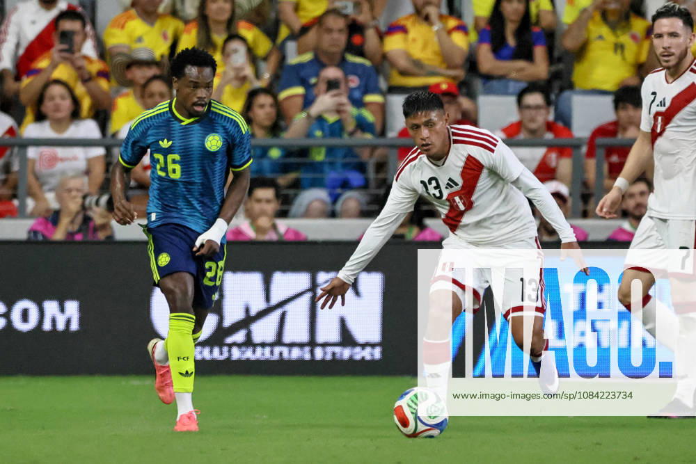 MIAMI, FL - OCTOBER 06: Marco Huaman 3 of Peru and Carlos Andres Gomez 26 of Colombia battle for a ball during an International Friendly, Länderspiel, Nationalmannschaft soccer match between Colombia and Peru at NU Stadium on October 06, 2026 in Miami, Florida.(Photo by Chris Arjoon Icon Sportswire) SOCCER: OCT 06 Colombia vs Peru Icon2610060000030