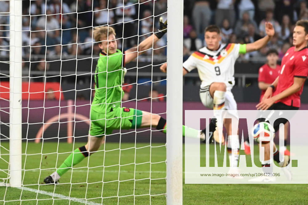 Nicolo TRESOLDI (GER) scoring chance, tackle, against goalkeeper Papuna Beruashvili (GEO) International soccer match, U21, European Championship Qualifiers, Germany vs. Georgia 2–0 on October 6, 2026, Schüco Arena, Bielefeld, Â