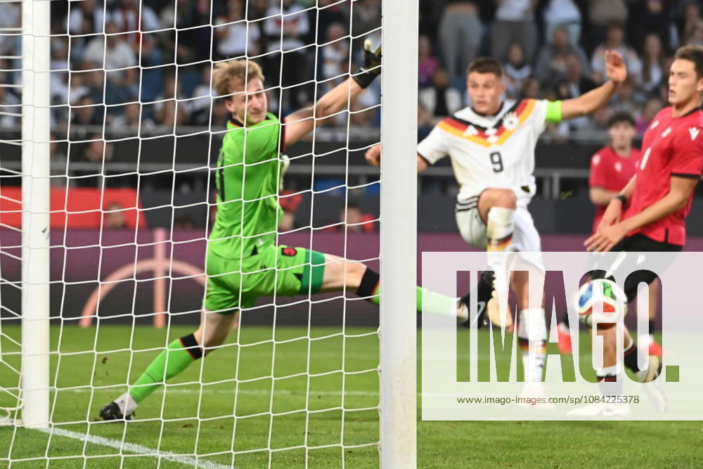 Nicolo TRESOLDI (GER) scoring chance, tackle, against goalkeeper Papuna Beruashvili (GEO) International soccer match, U21, European Championship Qualifiers, Germany vs. Georgia 2–0 on October 6, 2026, Schüco Arena, Bielefeld, Â
