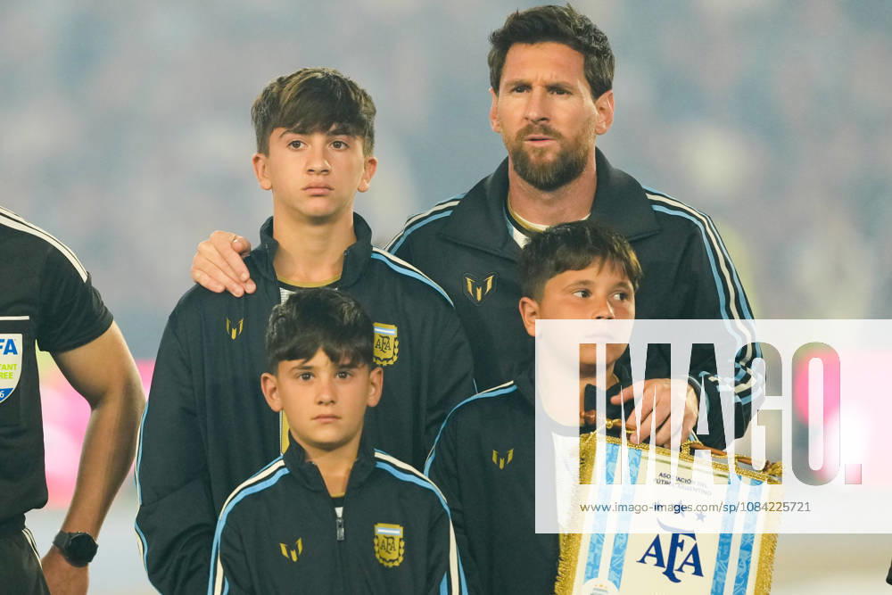 BUENOS AIRES, ARGENTINA 6 OCTOBER: Lionel Messi, an Argentina player, hugs his sons Thiago, Mateo and Ciro whilst the Argentine national anthem is being sung, during a friendly match between Argentina and Benin at the Estadio Monumental Antonio V. Liberti on 6 October 2026 in Buenos Aires, Argentina.