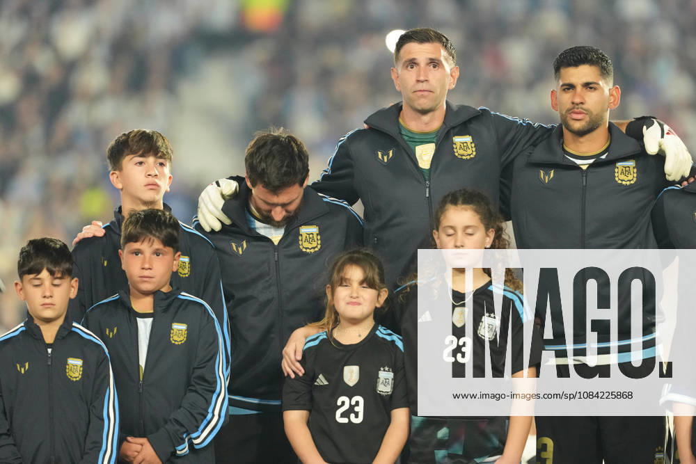 BUENOS AIRES, ARGENTINA 6 OCTOBER: Lionel Messi, an Argentina player, breaks down in tears whilst the Argentine national anthem is being sung, embraced by Emiliano Martinez and Gabriel Cuti Romero during a friendly match between Argentina and Benin at the Estadio Monumental Antonio V. Liberti on 6 October 2026 in Buenos Aires, Argentina.
