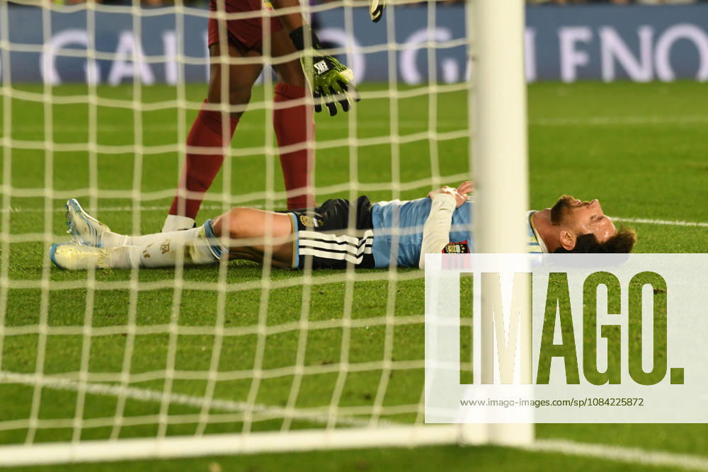 BUENOS AIRES, ARGENTINA 6 OCTOBER: Argentine footballer Lionel Messi falls to the ground following a move that almost resulted in a goal, and the opposing goalkeeper tries to help him up during a friendly match between Argentina and Benin at the Estadio Monumental Antonio V. Liberti on 6 October 2026 in Buenos Aires, Argentina.