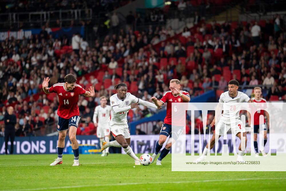 Eberechi Eze of England with the ball as Daniel Vasulin of Czechia closes during the Nations League match between England and Czechia at Wembley Stadium, London, England on 6 October 2026.