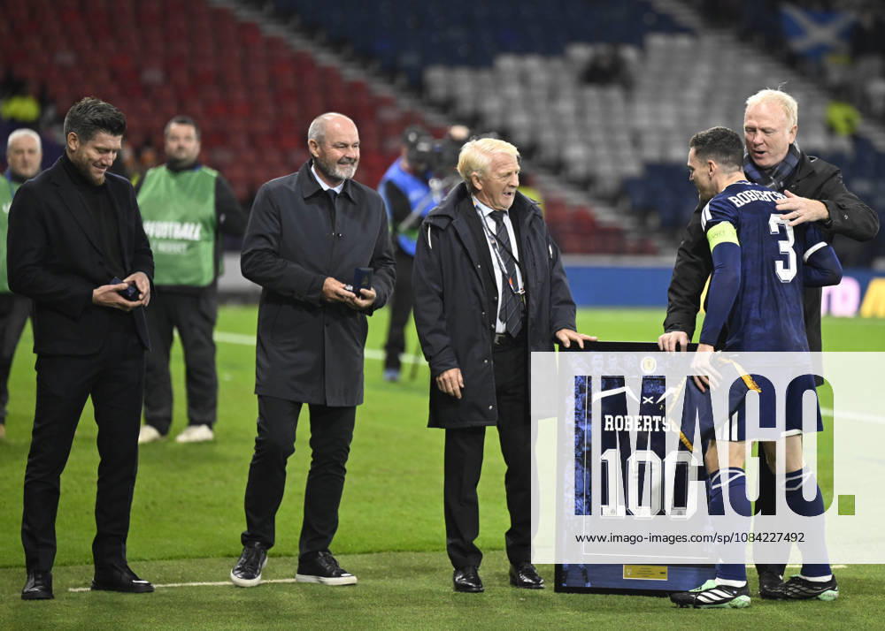 Glasgow, Scotland, 6th October 2026. Scotland head coach, Sebastien Pocognoli with former Scotland & Andy Robertsons managers Steve Clarke, Gordon Strachan and Alex McLeish wait to present a framed shiirt to mark Roberstons 100 cap during the Scotland vs Slovenia UEFA Nations League match at Hampden Park, Glasgow. Picture credit should read: Neil Hanna Sportimage . SPI_093_NH_Scotland_Slovenia SPI-5054-0093