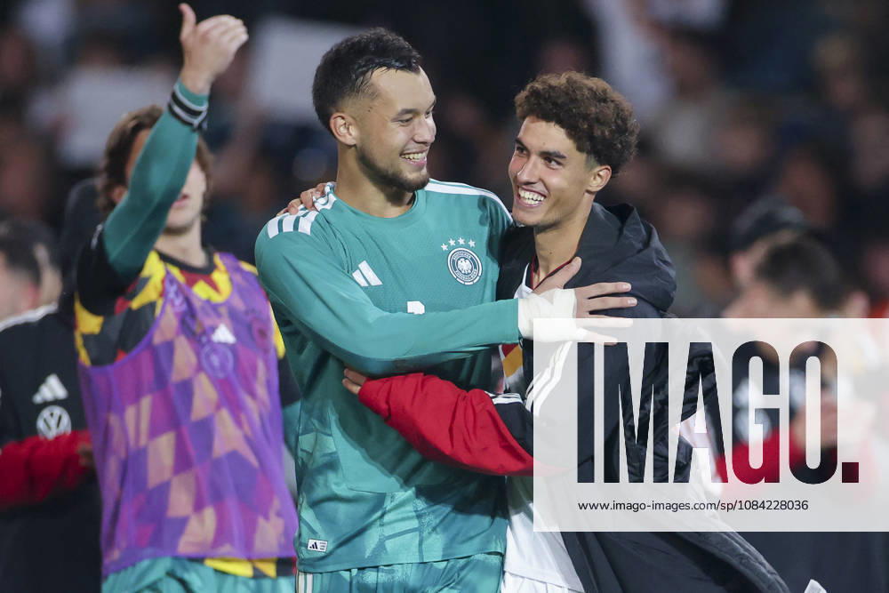 Goalkeepers Mio Backhaus (Germany) and Noah Darvich (Germany) cheer during the UEFA Under-21 EURO qualifier between Germany U21 and Georgia U21 at Almstadion on October 6, 2026, in Bielefeld, Germany. Photo by Marco Steinbrenner, DeFodi Images