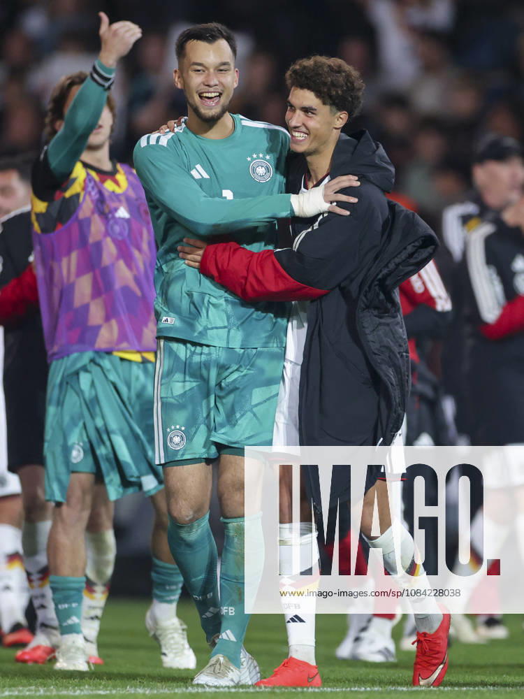 Goalkeepers Mio Backhaus (Germany) and Noah Darvich (Germany) cheer during the UEFA Under-21 EURO qualifier between Germany U21 and Georgia U21 at Almstadion on October 6, 2026, in Bielefeld, Germany. Photo by Marco Steinbrenner, DeFodi Images
