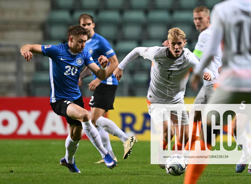 (261007) -- TALLINN, Oct. 7, 2026 -- Iceland s Hakon Arnar Haraldsson (R) breaks through past Estonia s Markus Poom during the UEFA Nations League 2026 27 League C Group C4 match between Estonia and Iceland at A. Le Coq Arena in Tallinn, Estonia, Oct. 6, 2026. (Photo by Xinhua) (SP)ESTONIA-TALLINN-FOOTBALL-UEFA NATIONS LEAGUE C-ESTONIA VS ICELAND SergeixStepanov