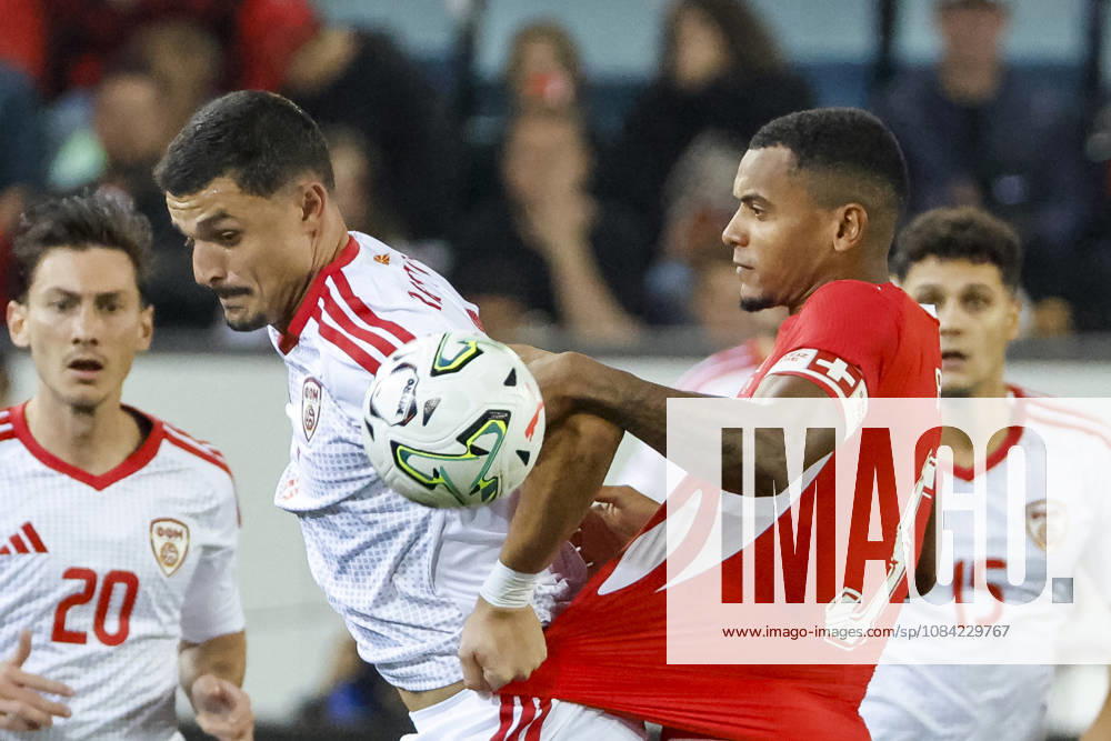 Elmin Rastoder of North Macedonia, 11, and Manuel Akanji of Switzerland, 05, in a tackle; Switzerland, UEFA, Nations League, Matchday 4, Switzerland vs. North Macedonia, October 6, 2026, Swissporarena, Lucerne, Switzerland