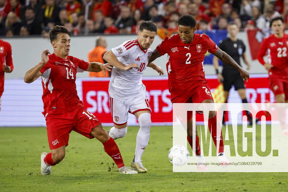 Ardon Jashari (Switzerland), 14, Enis Bardhi (North Macedonia), 10, and Sascha Britschgi (Switzerland), 2, battling for the ball; Switzerland, UEFA, Nations League, Matchday 4, Switzerland vs. North Macedonia, October 6, 2026, Lucerne, Swissporarena, Switzerland