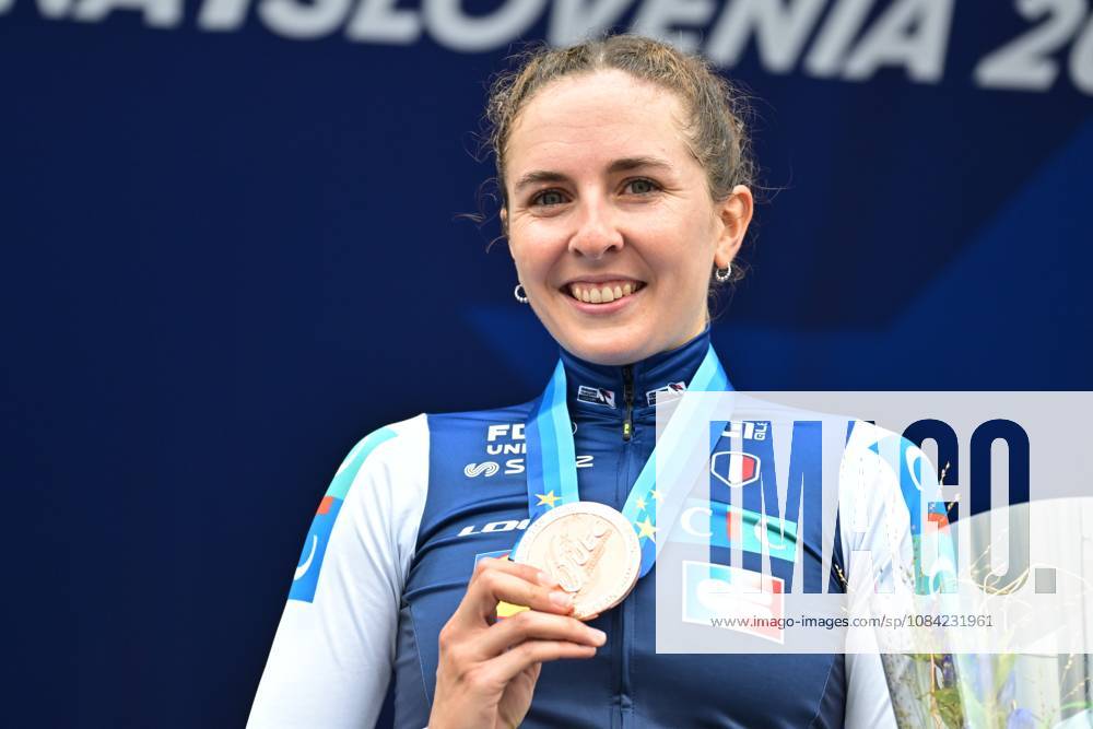 France s Juliette Berthet , winner of the bronze medal celebrates on the podium of the Women Elite Individual Time Trial race (22km) at the cycling UEC Road European Championships, in Ljubljana, Slovenia, on Wednesday 7 October 2026. The UEC Road European Championships are taking place from 02 to 07 October in Ljubljana, Slovenia. DAVIDxPINTENS x189053639x