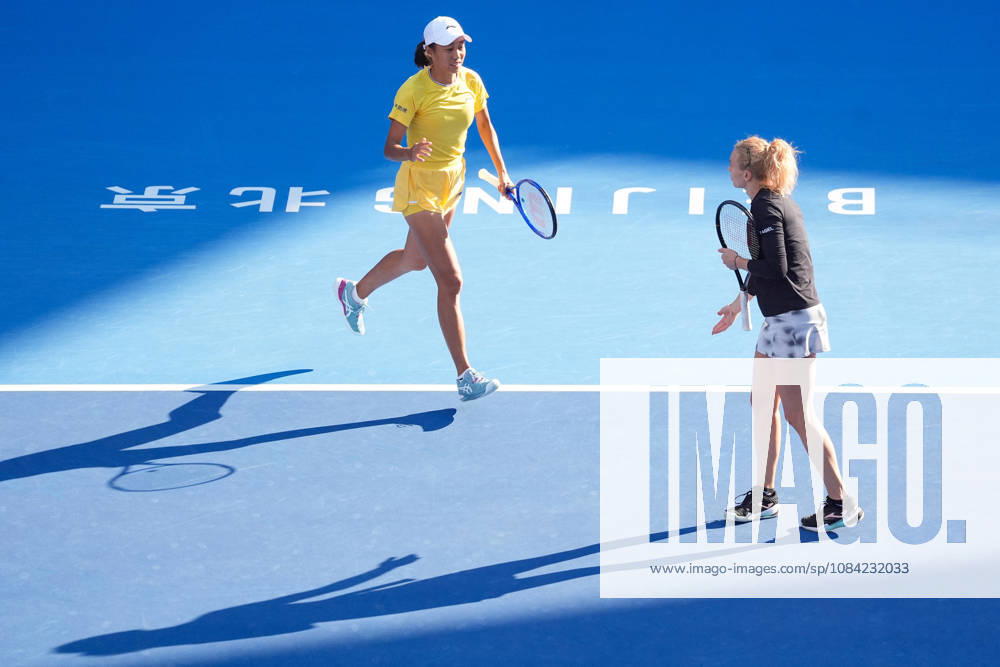 (261007) -- BEIJING, Oct. 7, 2026 -- Katerina Siniakova Zhang Shuai (L) compete during the women s doubles round of 16 match between Katerina Siniakova(the Cezch Republic) Zhang Shuai(China) and Nikola Bartunkova(the Cezch Republic) Maja Chwalinska(Poland) at 2026 China Open tennis tournament in Beijing, China, Oct. 7, 2026. ) (SP)CHINA-BEIJING-TENNIS-CHINA OPEN-WOMEN S DOUBLES (CN) JuxHuanzong