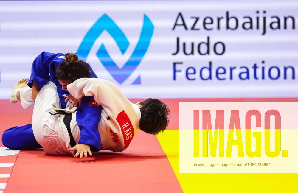 AZERBAIJAN, BAKU - OCTOBER 7, 2026: Kerem Primo (L) of Israel and Haruka Kaju of Japan compete in a -63 kg bout as part of the 2026 World Judo Championships at the National Gymnastics Arena 2026 World Judo Championships In Baku - ZUMAt113 20261007_zaa_t113_417