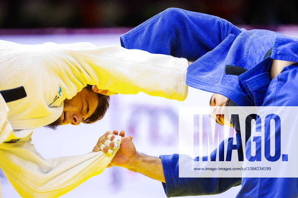 AZERBAIJAN, BAKU - OCTOBER 7, 2026: Omar Radzhabli (L) of Azerbaijan and Abylaikhan Zhubanazar of Kazakhstan compete in their -81 kg bout as part of the 2026 World Judo Championships at the National Gymnastics Arena. Mikhail Sinitsyn TASS 98914690