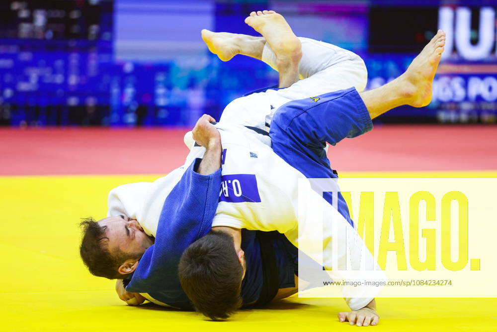 AZERBAIJAN, BAKU - OCTOBER 7, 2026: Omar Radzhabli (top) of Azerbaijan and Abylaikhan Zhubanazar of Kazakhstan compete in their -81 kg bout as part of the 2026 World Judo Championships at the National Gymnastics Arena 2026 World Judo Championships In Baku - ZUMAt113 20261007_zaa_t113_442