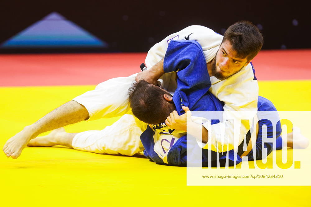 AZERBAIJAN, BAKU - OCTOBER 7, 2026: Omar Radzhabli (top) of Azerbaijan and Abylaikhan Zhubanazar of Kazakhstan compete in their -81 kg bout as part of the 2026 World Judo Championships at the National Gymnastics Arena. Mikhail Sinitsyn TASS 98915553