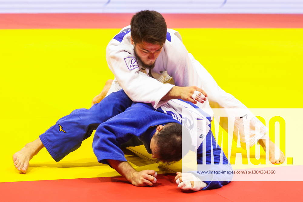 AZERBAIJAN, BAKU - OCTOBER 7, 2026: Omar Radzhabli (top) of Azerbaijan and Abylaikhan Zhubanazar of Kazakhstan compete in their -81 kg bout as part of the 2026 World Judo Championships at the National Gymnastics Arena 2026 World Judo Championships In Baku - ZUMAt113 20261007_zaa_t113_451