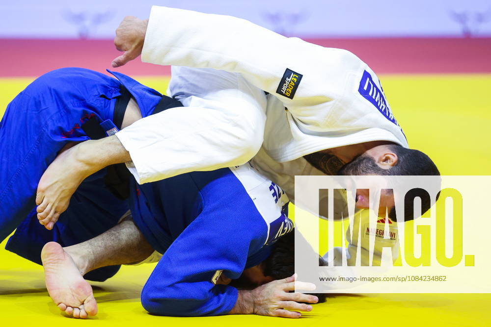 AZERBAIJAN, BAKU - OCTOBER 7, 2026: Zelim Tckaev (top) of Azerbaijan and Tato Grigalashvili of Georgia compete in their -81 kg bout as part of the 2026 World Judo Championships at the National Gymnastics Arena. Mikhail Sinitsyn TASS 98916900