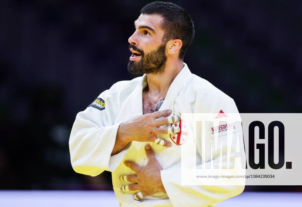 AZERBAIJAN, BAKU - OCTOBER 7, 2026: Tato Grigalashvili of Georgia wins Zelim Tckaev of Azerbaijan in a -81 kg bout as part of the 2026 World Judo Championships at the National Gymnastics Arena. Mikhail Sinitsyn TASS 98916227