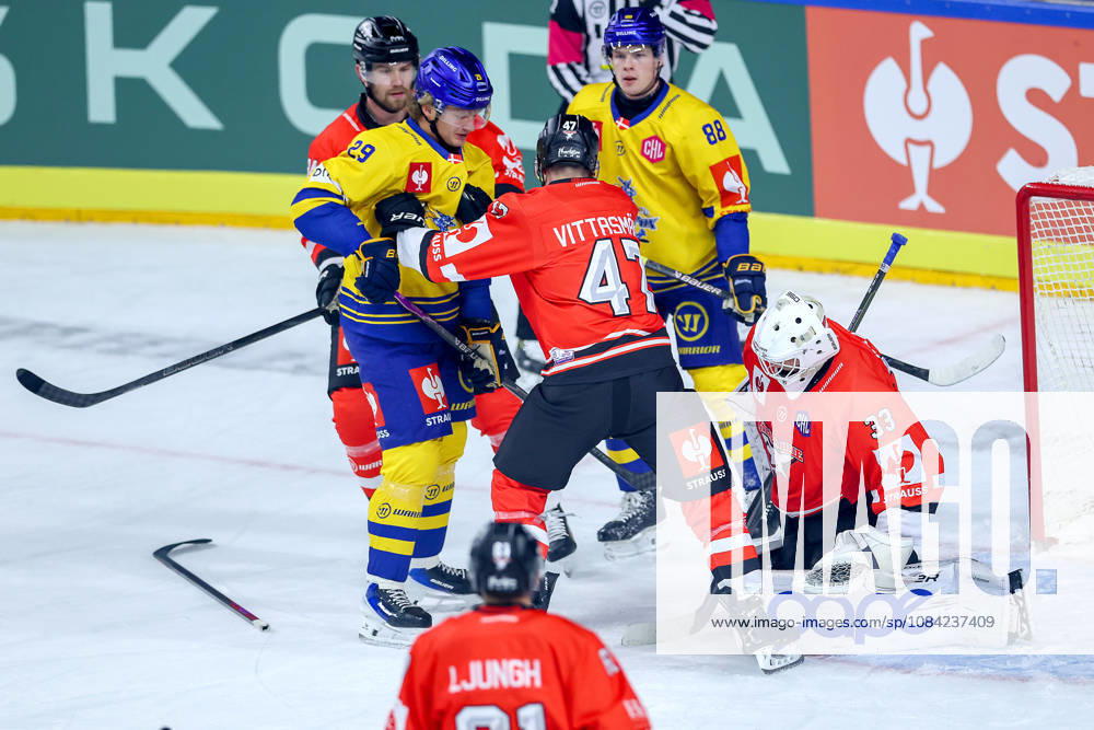 Ice Hockey, CHL, Kölner Haie vs. Blue Fox Herning, Champions Hockey League 2026–27, Matchday 5, 2026–27 Season, Lanxess Arena, Cologne: Veli Matti Vittasmäki (Cologne Sharks, No. 47) defends against Lukas Bang (Przemieslo, Blue Fox Herning, No. 29) in front of the net of goalie Nico Wiens (Cologne Sharks, No. 33), North Rhine-Westphalia, Germany