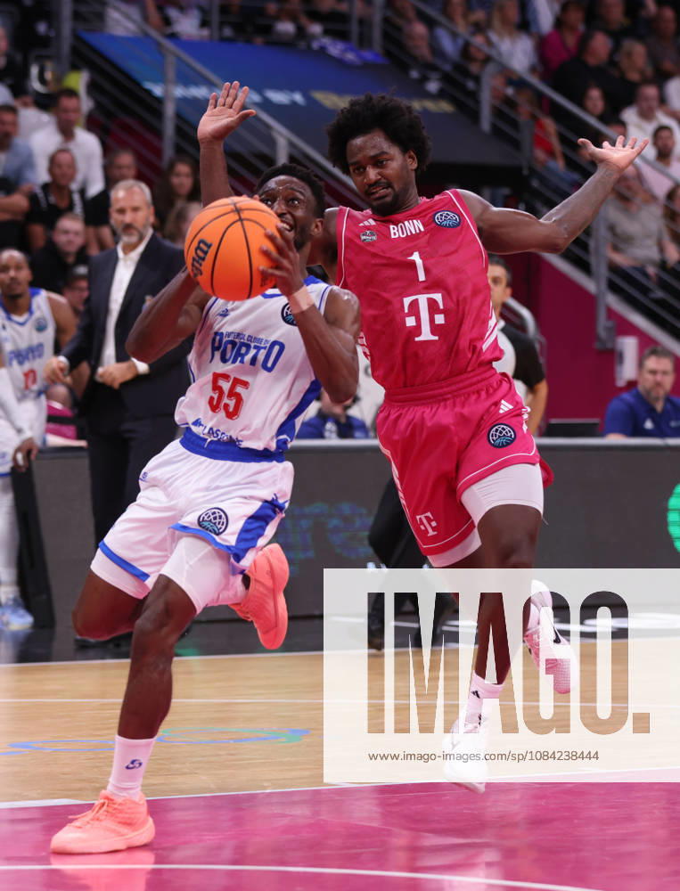 Childe Dundao of Porto with the ball against John Michael Wright of Bonn, BCL, Telekom Baskets Bonn vs. FC Porto, Bonn