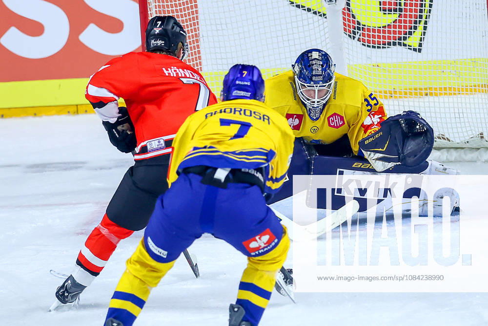 Ice Hockey, CHL, Kölner Haie vs. Blue Fox Herning, Champions Hockey League 2026–27, Matchday 5, 2026–27 Season, Lanxess Arena, Cologne: Carlos Händel, Kölner Haie 07, takes a shot on goal against Janis Fecers of Blue Fox Herning 35, North Rhine-Westphalia, Germany