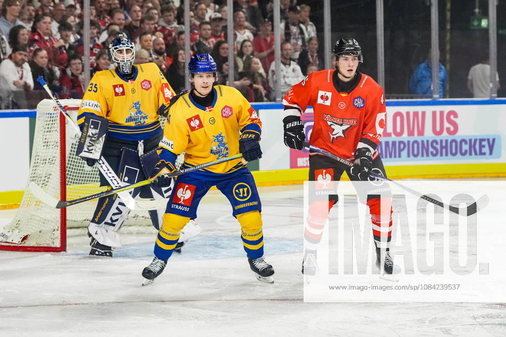 Ice Hockey CHL, Matchday 5: Kölner Haie vs. Herning Blue Fox on October 7, 2026, at the Lanxess Arena in Cologne. Jänis Fecers (Herning), left; Mads Skov Larsen (Herning), center; Kevin Niedenz (Cologne), right