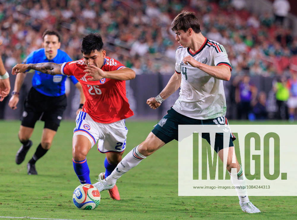 Armando Gonzalez 14 of Mexico wins the ball from Diego Ulloa 26 of Chile during an International Friendly, Länderspiel, Nationalmannschaft match at Los Angeles Memorial Coliseum on Tuesday, October 6, 2026, in Los Angeles, California. Mexico loses to Chile, 0-2. JAVIER ROJAS PI Los Angeles USA - ZUMAp124 20261006_zaa_p124_161