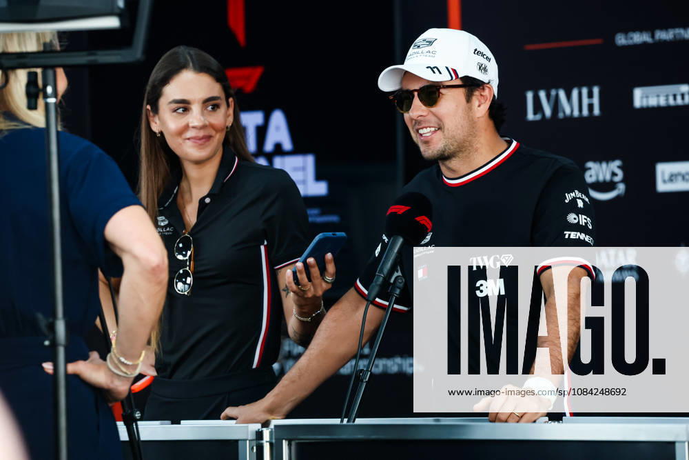 F1 - SINGAPORE GRAND PRIX 2026 PEREZ Sergio (mex), Cadillac F1 Team MAC-26, portrait with India de la Fressange, communications manager at Cadillac F1 Team during an interview lduring the 2026 Formula 1 Singapore Grand Prix, 17th round of the 2026 Formula One World Championship, WM, Weltmeisterschaft from October 9 to 11, 2026 on the Marina Bay Street Circuit, in Singapore, Singapore - SingaporeSingapore