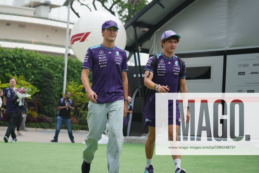 George Russell (GBR) (Mercedes-AMG Petronas F1 Team) and Andrea Kimi Antonelli (ITA) (Mercedes-AMG Petronas F1 Team) in the paddock of the Formula 1 Singapore Grand Prix 2026 at the Marina Bay Street Circuit. F1 2026: (Paddock) Singapore Grand Prix In Singapore, Singapore - 08 Oct 2026 - ZUMAs197 20261008_aaa_s197_007
