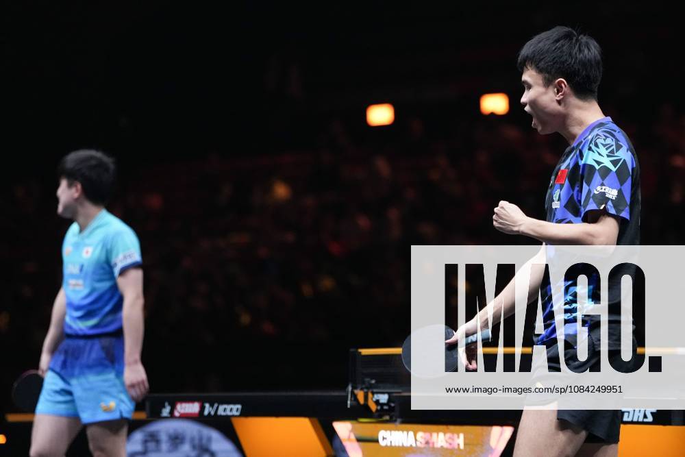 (261008) -- BEIJING, Oct. 8, 2026 -- Zhou Qihao (R) of China celebrates scoring during the men s singles round of 16 match between Zhou Qihao of China and Harimoto Tomokazu of Japan at 2026 World Table tennis, Tischtennis (WTT) China Smash in Beijing, China, Oct. 8, 2026. ) (SP)CHINA-BEIJING-TABLE TENNIS-WTT-CHINA SMASH-MEN S SINGLES (CN) JuxHuanzong