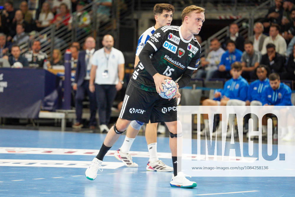 Pictured: Tobias Grondahl of Fuechse Berlin, 15, taking a free throw on October 8, 2026; Fuechse Berlin vs. FC Porto, EHF Handball Champions League, 2026–27 season, Max Schmeling Halle