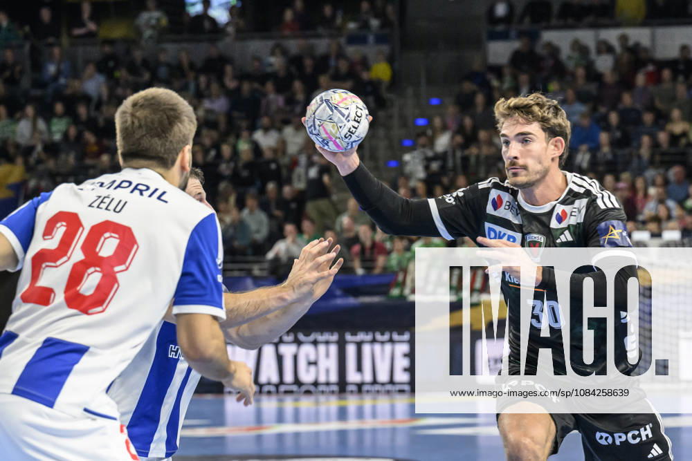Pictured from left: Jose Ferreira (FC Porto), 28; Aymeric Zaepfel (Füchse Berlin), 30; tackle, action, battle, fighting for the ball, GER, Berlin, handball, Füchse Berlin vs. FC Porto, EHF Champions League, Matchday 3 of Group A, at the Max Schmeling Halle, Am Falkplatz 1, October 8, 2026,