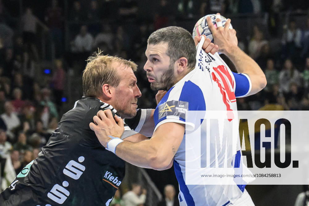 In the photo, from left: Max Darj, Füchse Berlin, 05; Rui Silva, FC Porto, 14; one-on-one, action, battle, fighting for the ball, GER, Berlin, handball, Füchse Berlin vs. FC Porto, EHF Champions League, Matchday 3 of Group A, at the Max Schmeling Halle, Am Falkplatz 1, October 8, 2026,
