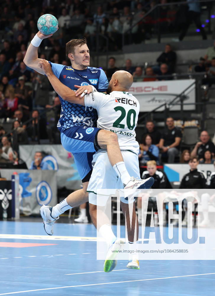 TVB Stuttgart vs. HSG Wetzlar handball game; from left: Simone Mengon (TVB), David Cyrill Akakpo (Wetzlar)