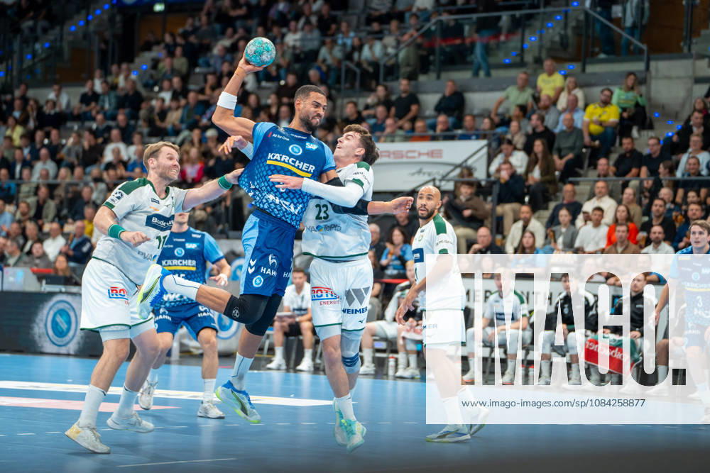 Handball I Men I 2026–2027 Season I Bundesliga I Matchday 8 I TVB Stuttgart vs. HSG Wetzlar I October 8, 2026 Philipp Ahouansou 5, TVB Stuttgart on a shot, Petter Overby Överby 11, HSG Wetzlar and Marti Soler Biescas 23, HSG Wetzlar on defense, Stuttgart Porsche Arena, Baden-Württemberg, Germany