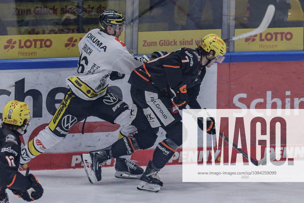 PEnny DEL Frankfurt Lions vs. Krefeld Penguins, October 8, 2026: Ty Glover (Löwen Frankfurt) 7 and Daniel Bruch (Krefeld Pinguine) 26 battling for the puck, Löwen Frankfurt vs. Krefeld Pinguine, Frankfurt, NIX Ice Arena