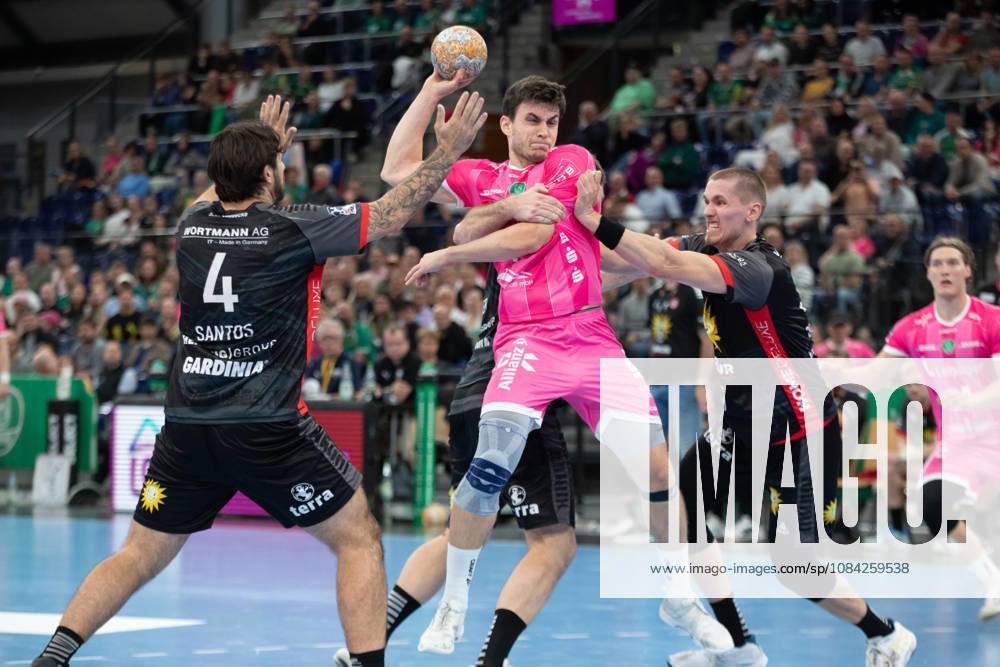 Handball, HBL2: SC DHfK Leipzig vs. TuS N Lübbecke, October 8, 2026; Matej Klima 13; SC DHfK Leipzig is stopped by three players from Lübbecke. Handball, 2nd Bundesliga, 2026–2027 season, Matchday 7: SC DHfK Leipzig vs. TuS N Lübbecke on October 8, 2026, at the Quarterback Immobilien Arena Leipzig