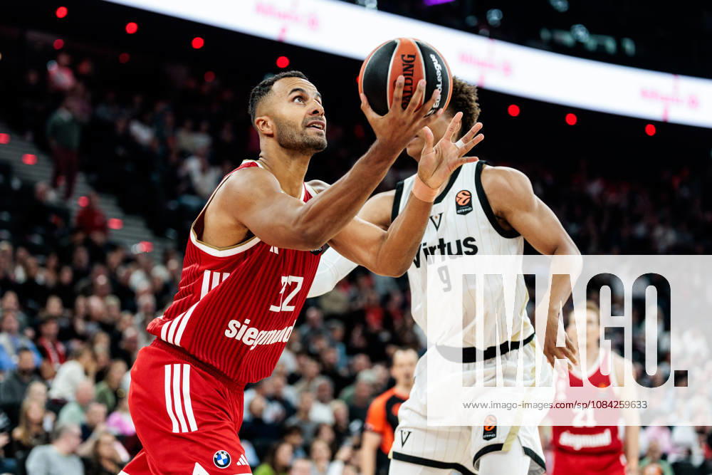Johannes JT Thiemann (FC Bayern Muenchen, 32) controls the ball against Kessler Edwards (Virtus Bologna, 9) during the Turkish Airlines EuroLeague match between FC Bayern Muenchen vs. Virtus Bologna at SAP Garden on round 4 of Turkish Airlines EuroLeague on October 08, 2026 in Munich, Germany. Bavaria Germany