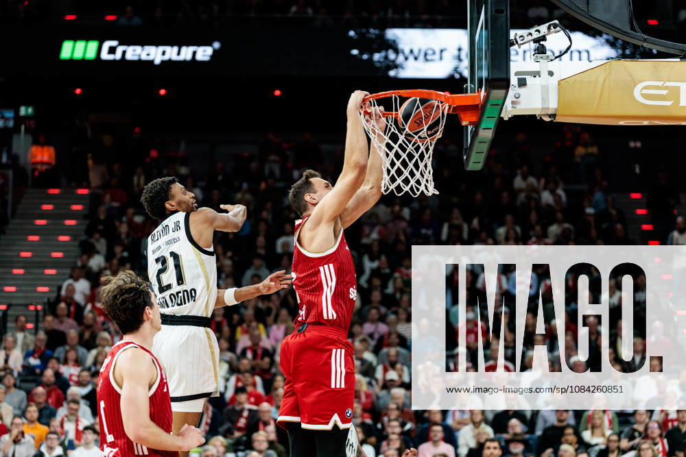Johannes Jo Voigtmann (FC Bayern Muenchen, 7) dunking the ball against Derrick Alston Jr. (Virtus Bologna, 21) during the Turkish Airlines EuroLeague match between FC Bayern Muenchen vs. Virtus Bologna at SAP Garden on round 4 of Turkish Airlines EuroLeague on October 08, 2026 in Munich, Germany. Bavaria Germany