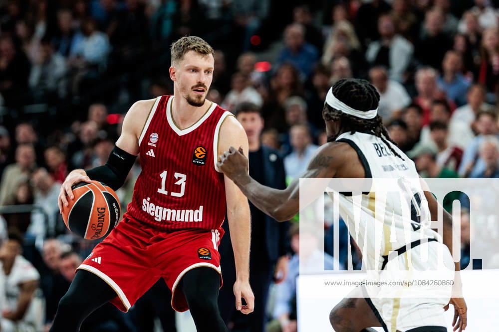 Andreas Andi Obst (FC Bayern Muenchen, 13) controls the ball against Rasheed Bello (Virtus Bologna, 0) during the Turkish Airlines EuroLeague match between FC Bayern Muenchen vs. Virtus Bologna at SAP Garden on round 4 of Turkish Airlines EuroLeague on October 08, 2026 in Munich, Germany. Bavaria Germany