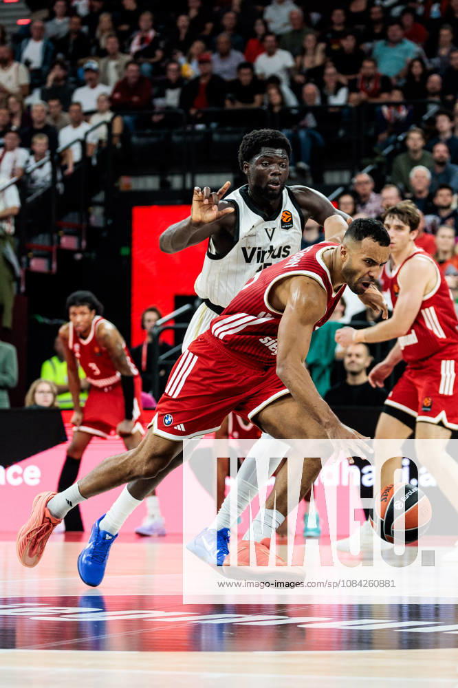 Johannes JT Thiemann (FC Bayern Muenchen, 32) controls the ball against Mouhamet Diouf (Virtus Bologna, 35) during the Turkish Airlines EuroLeague match between FC Bayern Muenchen vs. Virtus Bologna at SAP Garden on round 4 of Turkish Airlines EuroLeague on October 08, 2026 in Munich, Germany. Bavaria Germany