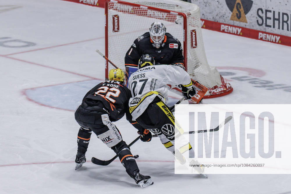Penny DEL Löwen Frankfurt vs. Krefeld Pinguine, October 8, 2026: Timo Kose (Löwen Frankfurt, No. 22) and C. J. Suess (Krefeld Pinguine, No. 27) battle Nico Pertuch (Löwen Frankfurt, No. 1) for the puck; Löwen Frankfurt vs. Krefeld Pinguine, Frankfurt, NIX Ice Arena