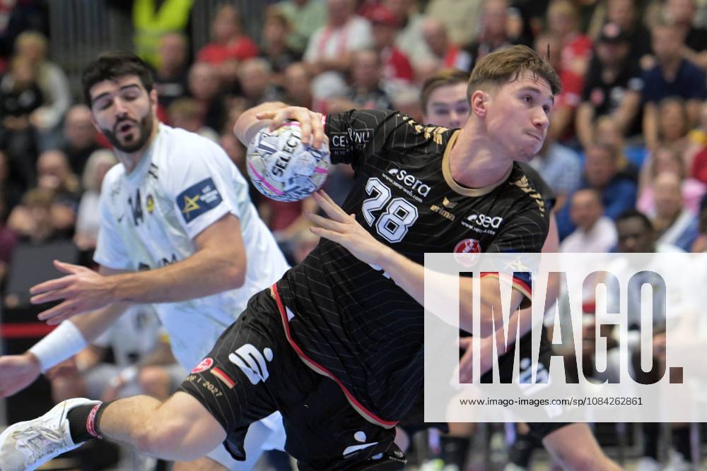 Luca Sigrist (MT Melsungen 28) takes a shot; Imanol Garciandia (HBC Nantes 14) in the background, GER, MT Melsungen vs. HBC Nantes (FRA), Handball, Men s Champions League, Group Matches, 2026–2027 Season, October 8, 2026, GER, MT Melsungen vs. HBC Nantes, Handball, Men’s Champions League, Group Match, 2026–2027 Season, October 8, 2026, Kassel