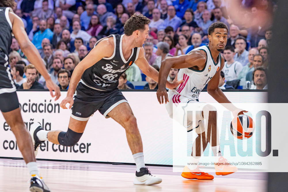 ESP EuroLeague: Real Madrid vs. Partizan Belgrade — Alesandro Pajola of Partizan and Theo Maledon of Real Madrid during the EuroLeague game between Real Madrid and Partizan Mozzart Bet Belgrade, played at Movistar Arena on October 8, 2026, in Madrid, Spain. Madrid, Spain. Basketball