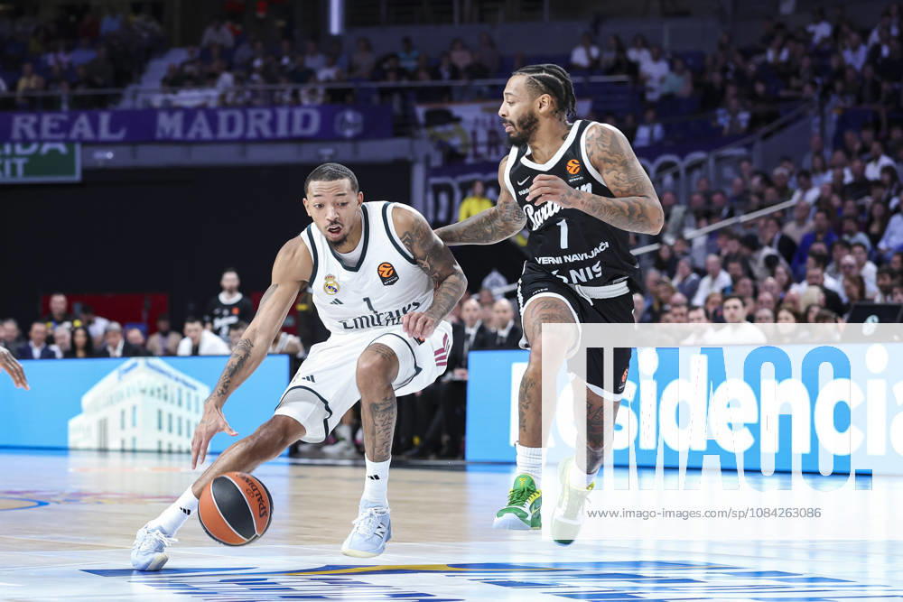 Nick Smith Jr. of Real Madrid and Carlik Jones of Partizan Mozzart Bet Belgrade in action during the Euroleague Basketball Regular Season Round 4 game between Real Madrid v Partizan Mozzart Bet Belgrade at Movistar Arena on October 08, 2026 in Madrid, Spain. Madrid Spain - ZUMAa181 20261008_zaa_a181_239
