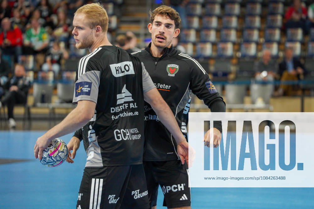 Pictured: Matthes Langhoff (Füchse Berlin, 25) and Aymeric Zaepfel (Füchse Berlin, 30) before the game on October 8, 2026—Füchse Berlin vs. FC Porto, EHF Handball Champions League, 2026–27 season, Max Schmeling Halle