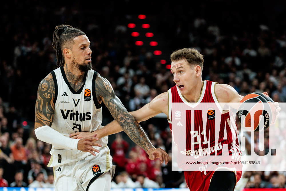 Rokas Jokubaitis (FC Bayern Muenchen, 31) controls the ball against Daniel Hackett (Virtus Bologna, 23) during the Turkish Airlines EuroLeague match between FC Bayern Muenchen vs. Virtus Bologna at SAP Garden on round 4 of Turkish Airlines EuroLeague on October 08, 2026 in Munich, Germany. Bavaria Germany