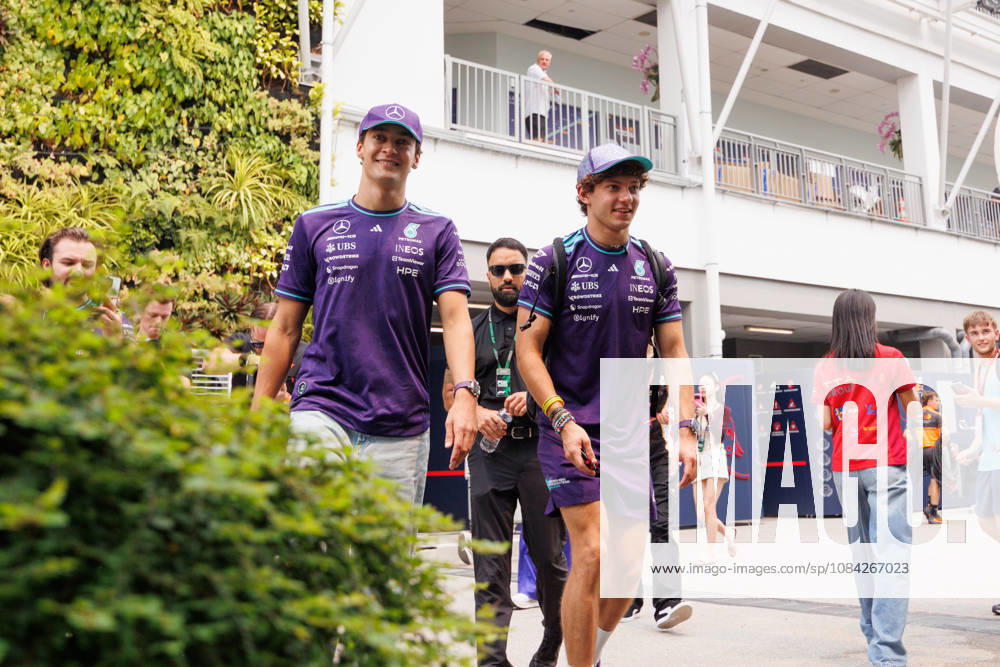 George Russell of Great Britain (L) and Kimi Antonelli of Italy (R) of the Mercedes-AMG PETRONAS Formula One Team walk through the paddock ahead of the F1 Grand Prix of Singapore at the Marina Bay Street Circuit. Formula 1, Singapore Grand Prix 2026, Media Day - 08 Oct 2026 - ZUMAs197 20261008_aaa_s197_149