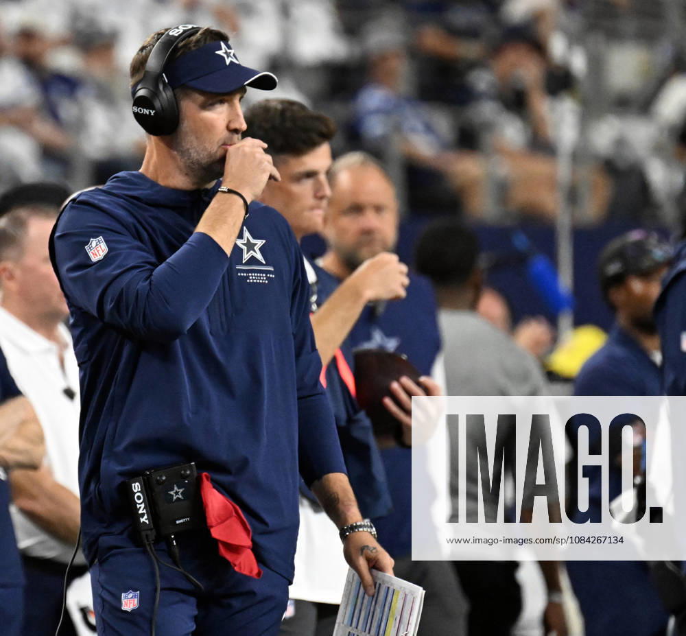 Dallas Cowboys head coach Berian Schottenheimer calls plays against the Tampa Bay Buccaneers during their game at AT&T Stadium in Arlington, Texas on Thursday, October 8, 2026. ARL2026100818 IANxHALPERIN